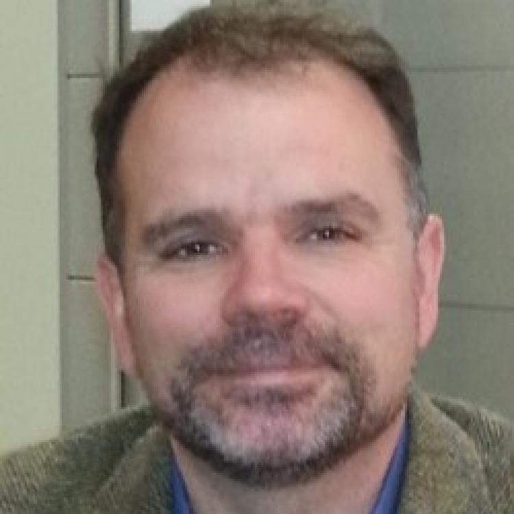 Dr.  Andrew G. Robinson