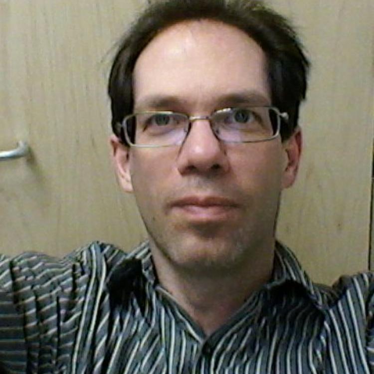 Dr.  Greg Salomons